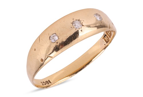 Lot 14 - A diamond gypsy ring, flush-set with three old...