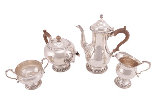 Lot 249 - A silver four-piece tea service, London 1956,...