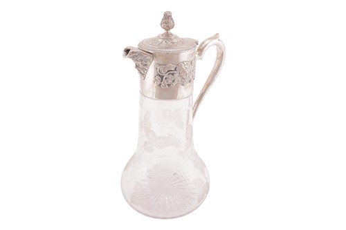 Lot 259 - Asprey & Co. - A silver-mounted claret jug,...