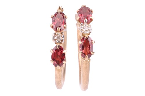 Lot 101 - A pair of hoop earrings set with oval-cut...