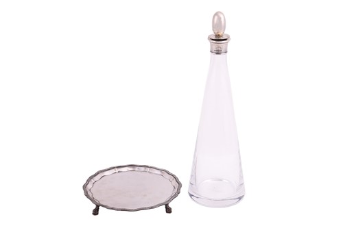 Lot 245 - Mappin and Webb - A glass decanter with silver...