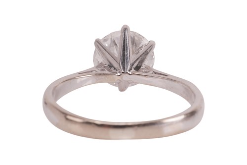 Lot 195 - A diamond single stone ring, set with a round...