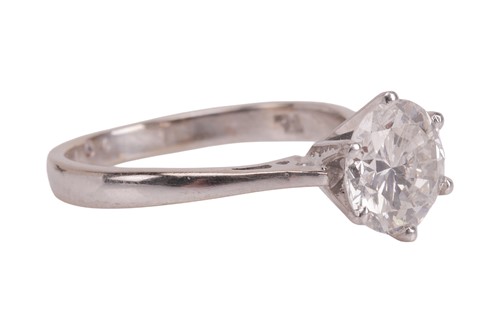 Lot 195 - A diamond single stone ring, set with a round...