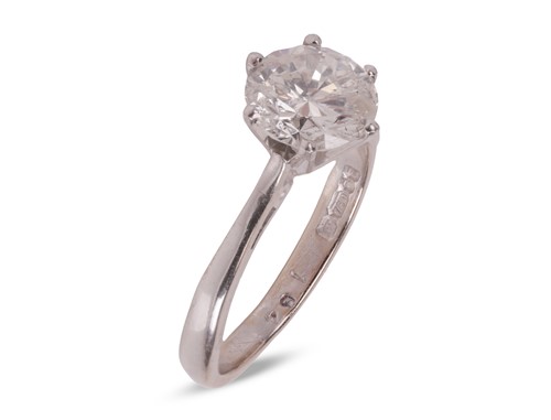 Lot 195 - A diamond single stone ring, set with a round...