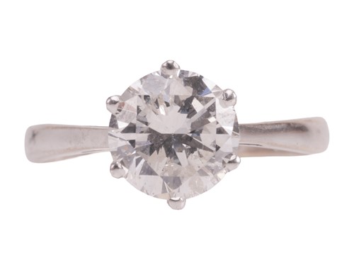 Lot 195 - A diamond single stone ring, set with a round...