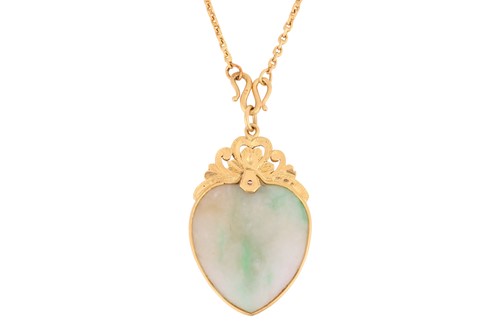 Lot 104 - A Chinese jade heart pendant on chain, the...