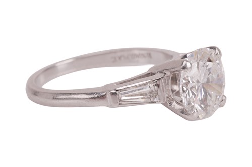 Lot 55 - An Art Deco diamond solitaire ring, featuring...