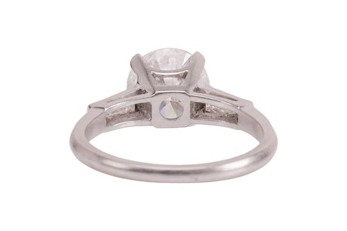 Lot 55 - An Art Deco diamond solitaire ring, featuring...