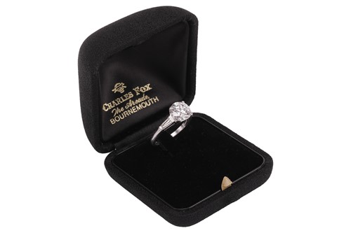 Lot 55 - An Art Deco diamond solitaire ring, featuring...