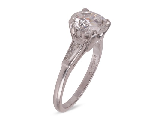 Lot 55 - An Art Deco diamond solitaire ring, featuring...