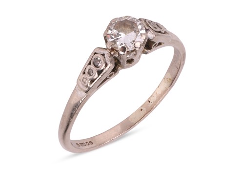 Lot 47 - A diamond solitaire ring, featuring a claw-set...