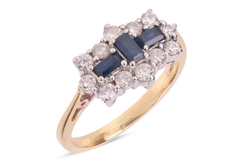 Lot 142 - A sapphire and diamond cluster ring, featuring...
