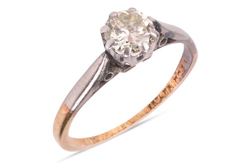 Lot 49 - A diamond solitaire ring, claw-set with a...
