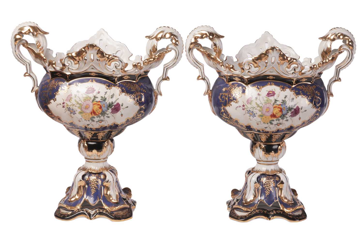 Lot 36 - A pair of large Continental porcelain pedestal...