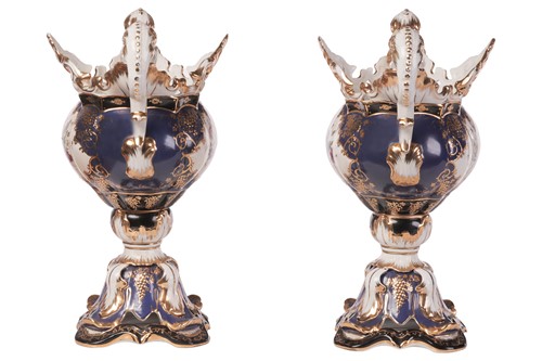 Lot 36 - A pair of large Continental porcelain pedestal...
