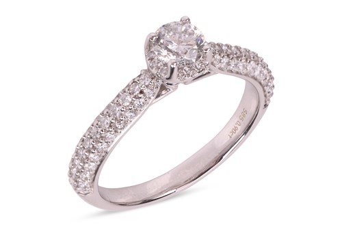 Lot 152 - A diamond solitaire ring, featuring a central...
