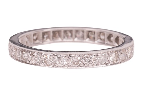 Lot 53 - A diamond-set full eternity ring, grain-set...