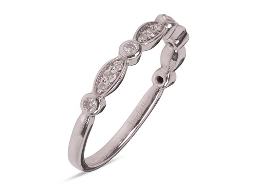 Lot 178 - A diamond-set half eternity ring in 18ct white...