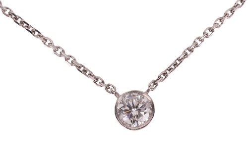 Lot 174 - A diamond pendant on chain, featuring a round...