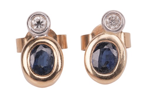 Lot 125 - A pair of sapphire and diamond stud earrings...