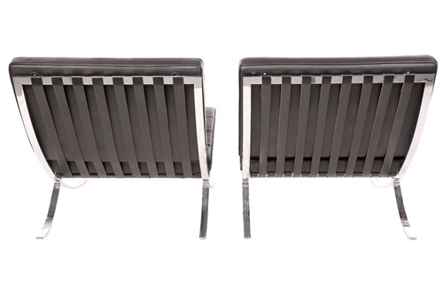 Lot 59 - A pair of Barcelona-style chairs, after Mies...
