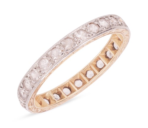 Lot 45 - A white sapphire full eternity ring, featuring...