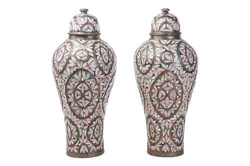Lot 13 - A pair of large Moroccan earthenware floor...