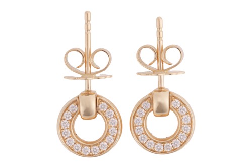 Lot 188 - Boodles - A pair of 'Roulette' flip earrings,...