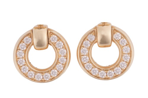 Lot 188 - Boodles - A pair of 'Roulette' flip earrings,...