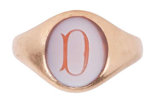 Lot 27 - A signet ring, set with an oval sardonyx...