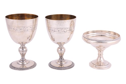 Lot 261 - Asprey - A pair of silver goblets; ovoid...