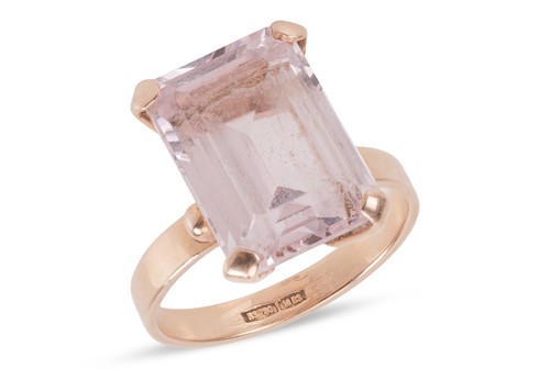 Lot 27 - A pink synthetic spinel ring, centrally-set...