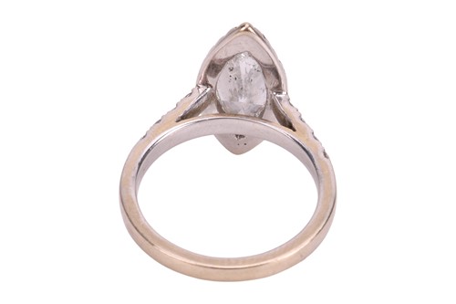 Lot 102 - A diamond solitaire ring, featuring a central...
