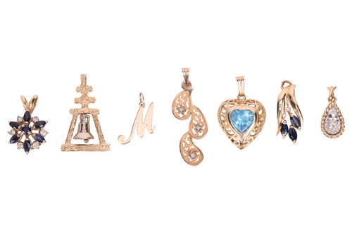 Lot 29 - A small group of seven pendant charms, all...