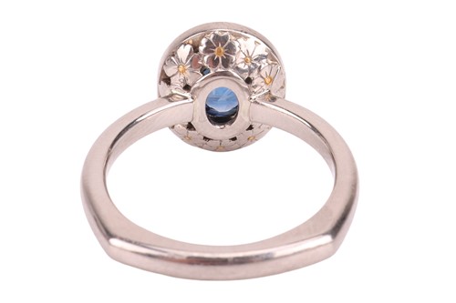 Lot A sapphire & diamond cluster ring, featuring a...