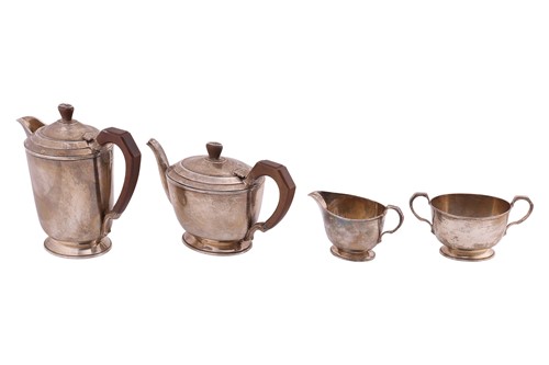 Lot 254 - A four piece Art Deco silver tea set, oval...