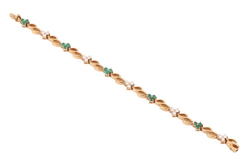 Lot 108 - An emerald and diamond bracelet, with ten...