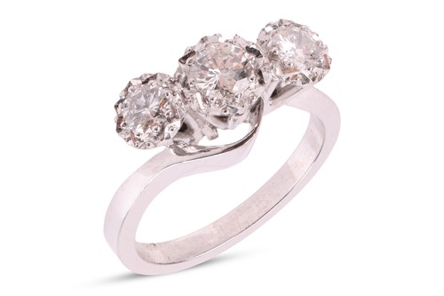 Lot 169 - A diamond-set three-stone ring, featuring...