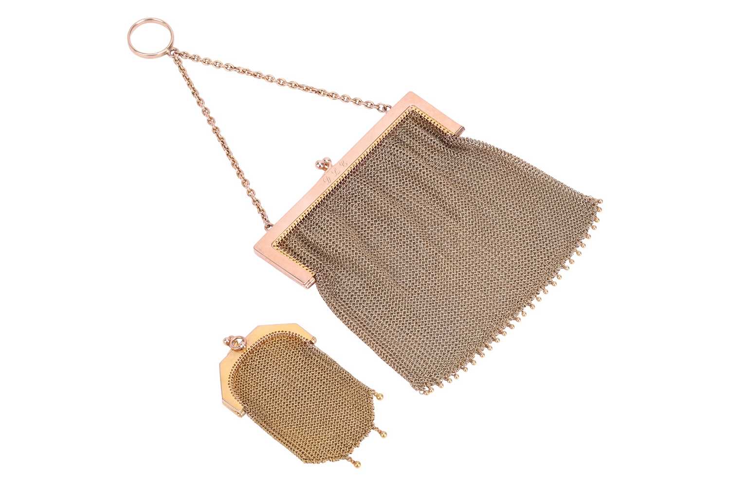 Lot 196 - Two early 20th century mesh evening purses in...