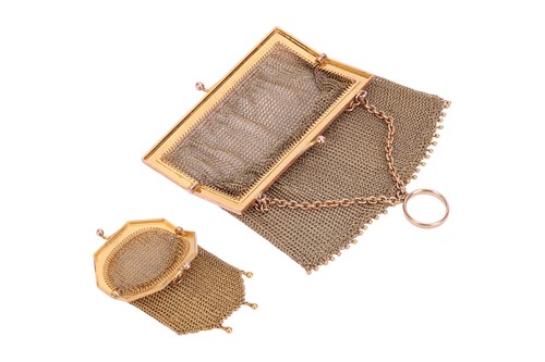 Lot 196 - Two early 20th century mesh evening purses in...