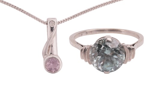Lot 49 - A zircon ring and an amethyst pendant, the...