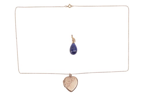 Lot 104 - A heart shaped locket on chain, the pendant...