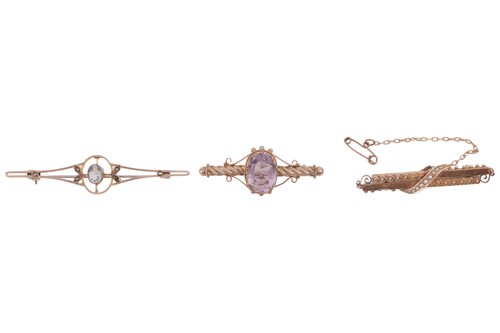 Lot 31 - Three Edwardian gem-set bar brooches, to...