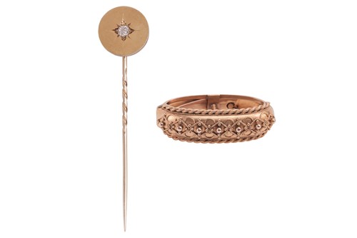 Lot 2 - A diamond-set stick pin and a scarf clip; the...