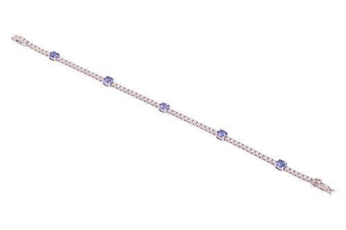 Lot 159 - A tanzanite and diamond-set bracelet,...