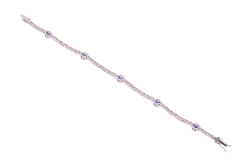 Lot 159 - A tanzanite and diamond-set bracelet,...