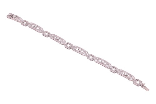 Lot An Edwardian diamond set bracelet, comprising...