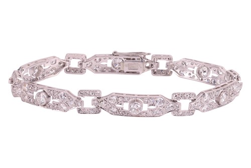 Lot An Edwardian diamond set bracelet, comprising...