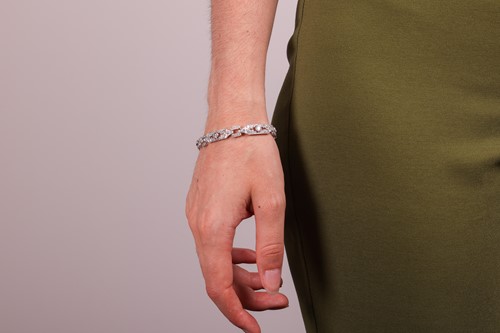 Lot An Edwardian diamond set bracelet, comprising...