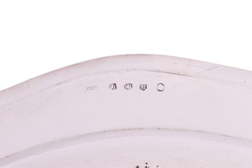 Lot 277 - A set of four George III Scottish silver meat...